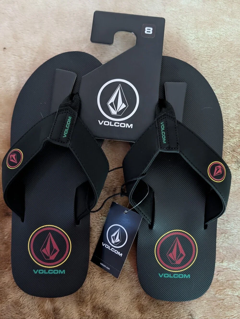 Volcom Men's Black Flip Flops with Red and Yellow Logo Accents